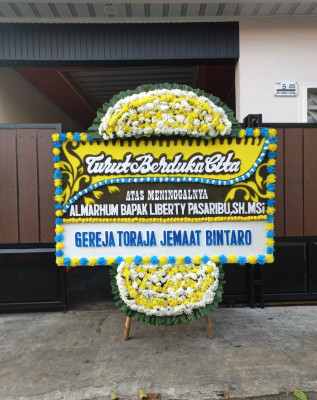 Papan Bunga Duka di Lolomatua